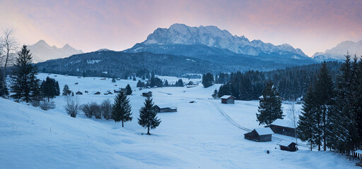 winter panorama Buckelwiesen landscape, tourist destination near Wallgau with dreamy pink clouds