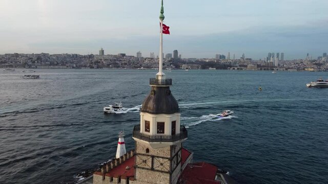 Drone aerial shot of Maiden's tower, also known as Leander's tower, located in Bosphorus strait separating the continents of Europe and Asia, city of Istanbul, Turkey.