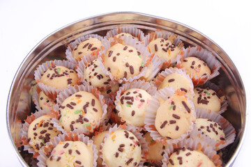 top view of canned dry brownies on white background.cupcake