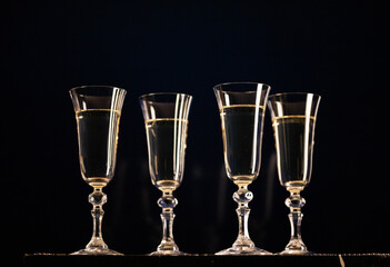 happy New Year champagne glasses and fireworks celebration background