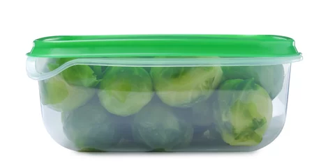 Muurstickers Brussels sprouts in plastic container isolated on white © New Africa