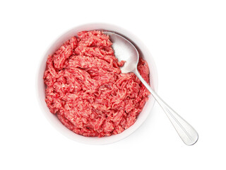 Fresh minced meat and spoon in bowl on white background, top view