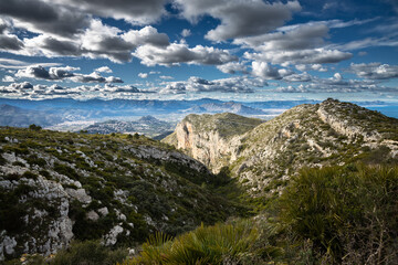 Fototapeta na wymiar Landscape view of the mountains and clouds, beautiful nature of Montgo mountain, Spain