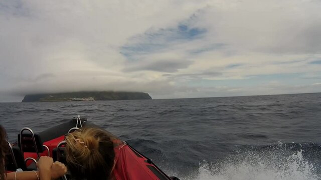 Slow motion video, on a boat at the Atlantic ocean, between Flores and Corvo island, Azores travel destination.