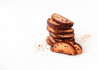 Vanilla rusks with raisins and sugar on a white background with space for text. 