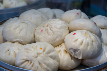 Traditional Chinese steamed bun in tray, Dumping chinese food or dim sum for sell in Chinatown...