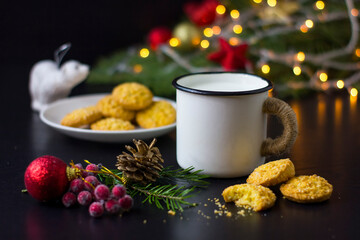 Cookies and milk for Santa Clause on wood table,