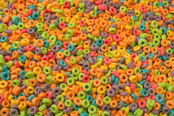 Sweet multicolored flakes, cereal loops.