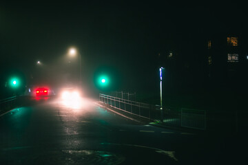 Street lights, foggy misty night