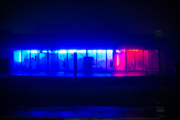 A night fuel station in the fog