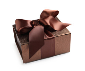 Brown gift box decorated with satin ribbon and bow on white background