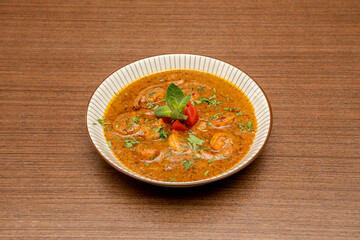 Prawn curry, is a typical curry dish of Burmese cuisine, Indonesian cuisine in Indonesia, Indo-Portuguese cuisine in India and Portugal, Mozambican cuisine in Mozambique and Thai cuisine in Thailand
