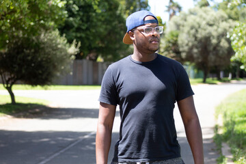 African Man Looking Straight ahead with glasses on