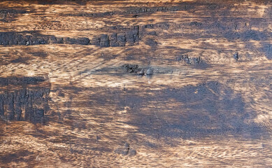 Aged wooden board with rough grunge texture for background