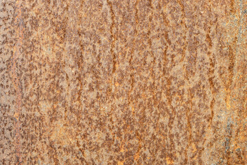 Abandoned old metal sheet with heavy brown rust for texture background
