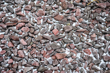 Pink and Grey Pebbles With Snow