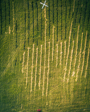 Aerial view of green fields during hot air balloons competitions, when the measuring team is waiting for the first balloons to approach the target, Ryazan, Russia.