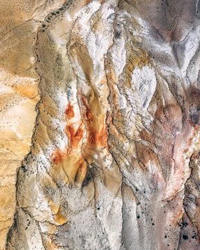 Aerial view of abstract colored landscape of the desert in place that named Altaian Mars, Kosh-Agach, Altai Republic, Russia.