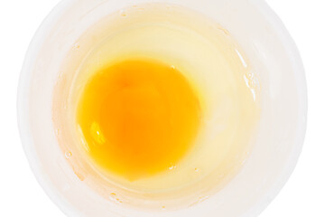 Broken chicken egg isolated on white background. Raw chicken egg