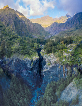 Aerial view of Three Roches waterfall at Riviere des Galets river, La Possession, Reunion.