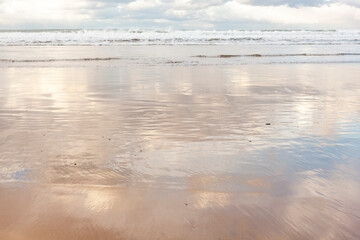 wet sand reflection sky beach