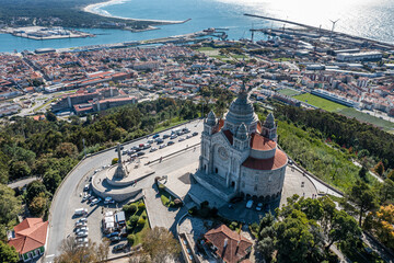 Aerial view of cathedral in Viana do Castelo with Atlantic ocean in the background, Portugal.