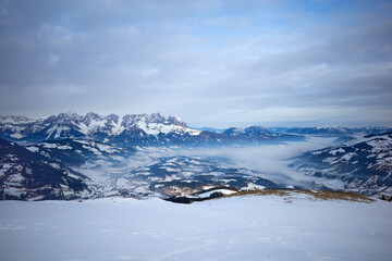 Fototapeta na wymiar Kitzbühel surrounded by mountains from Hahnenkamm, Tirol, Austria