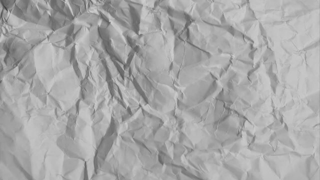 Stop Motion video from different crumpled wrinkled sheets of paper 