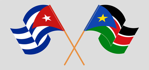 Crossed and waving flags of Cuba and South Sudan