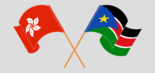Crossed and waving flags of Hong Kong and South Sudan