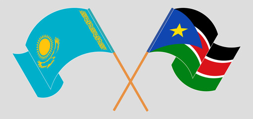 Crossed and waving flags of Kazakhstan and South Sudan