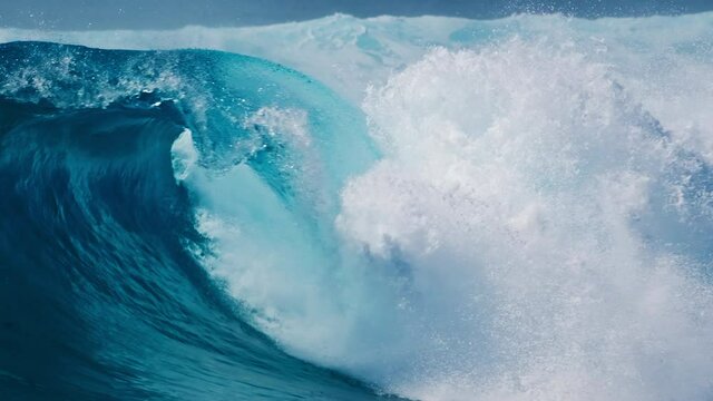 Wave. Powerful ocean wave breaks at the Sultans surf spot in Maldives