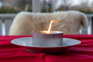 marshall candle on red cloth