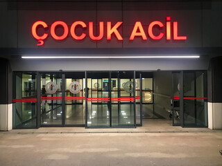 Kartal, Istanbul, Turkey - 07.24.2021: child emergency (cocuk acil in Turkish) sign on entrance gate exterior of Lutfi Kirdar Training and Research Hospital emergency department for healthcare