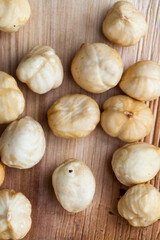 dried hazelnutsnuts on a wooden table