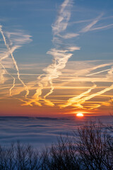 sunrise over a cloud inversion with vibrant colours
