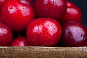 harvested ripe sweet cherries of red color