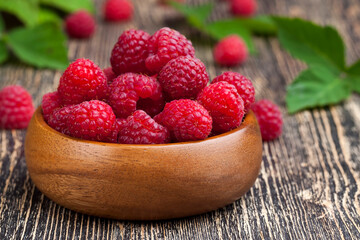 harvested red raspberries, close up