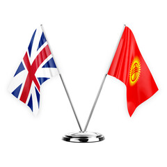 Two table flags isolated on white background 3d illustration, great britain and kyrgyzstan