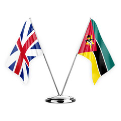 Two table flags isolated on white background 3d illustration, great britain and mozambique