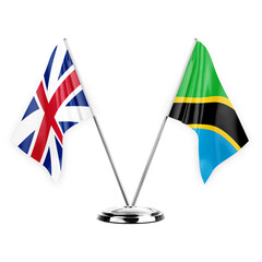 Two table flags isolated on white background 3d illustration, great britain and tanzania