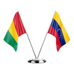 Two table flags isolated on white background 3d illustration, guinea and venezuela