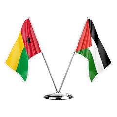 Two table flags isolated on white background 3d illustration, guinea-bissau and palestine