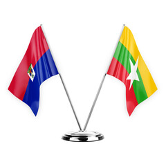 Two table flags isolated on white background 3d illustration, haiti and myanmar