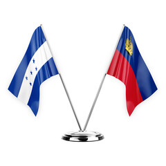 Two table flags isolated on white background 3d illustration, honduras and liechtenstein