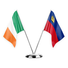 Two table flags isolated on white background 3d illustration, ireland and liechtenstein