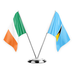 Two table flags isolated on white background 3d illustration, ireland and saint lucia