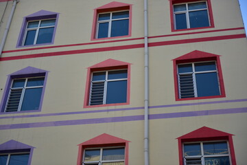 Close-up of windows and stairs of urban buildings