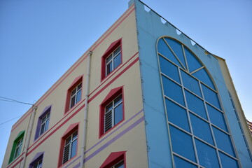 Close-up of windows and stairs of urban buildings