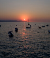 Puerto Vallarta sunset and fishing boats Mexico.
